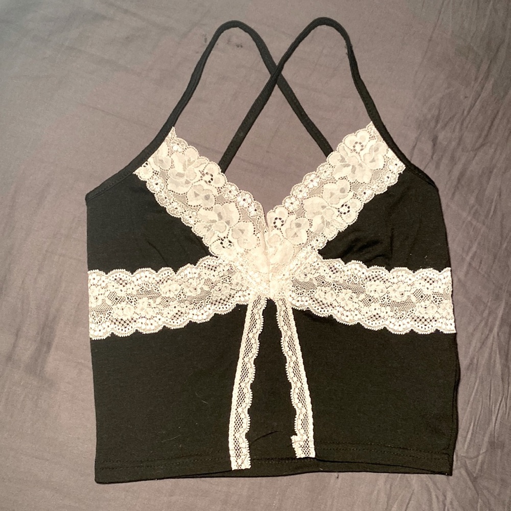Black lace crop top also with cross over back.